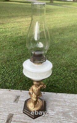 Antique Oil Lamp Figural Victorian Child, Milk Glass Tank, Metal Base, 23Tall