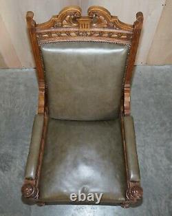 Antique Pair Of Ornately Carved Oak Framed Leather Victorian Throne Armchairs