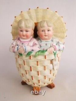 Antique Victorian Hand Painted Bisque Children Sitting in Hamper Basket Figurine