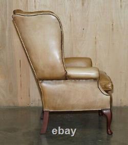 Pair Of Vintage Tan Brown Leather Chesterfield Wingback Chairs With Footstools