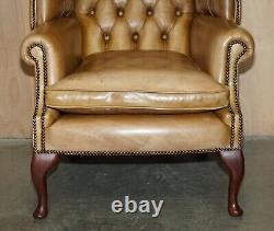 Pair Of Vintage Tan Brown Leather Chesterfield Wingback Chairs With Footstools