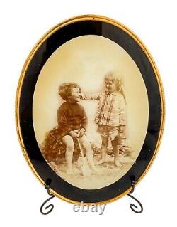 Victorian pair of wall ambrotype photos, gilt brass frames, small children